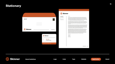 A digital mockup of Skinner-branded stationery on a black background, featuring an envelope, a business card, and a letterhead, each with orange accents and the Skinner logo.