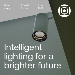 A cylindrical ceiling light fixture shines downward beside text that reads, Intelligent lighting for a brighter future. Additional text indicates its a case study on climate action from June 2022, with a geometric logo above.