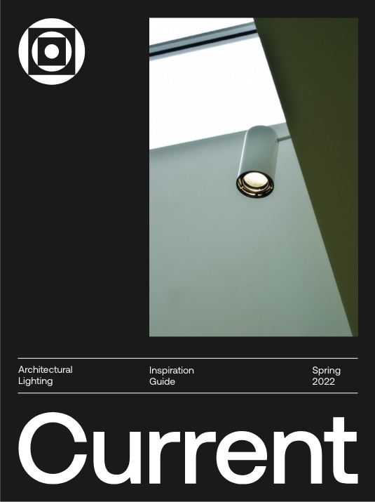 Cover of a magazine titled Current features a modern ceiling spotlight against a minimalist background. The text reads Architectural Lighting Inspiration Guide, Spring 2022.