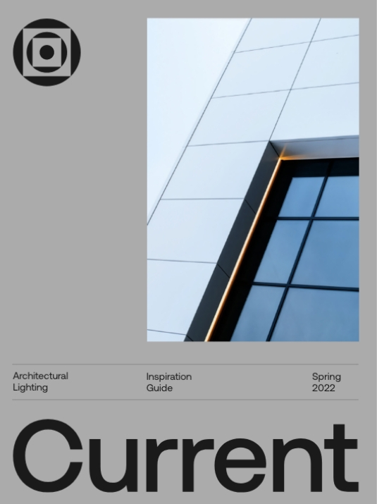 Cover of a magazine titled Current featuring a close-up photo of a modern building facade with geometric lines, white panels, and a reflective glass window. Text below reads: Architectural Lighting Inspiration Guide Spring 2022.