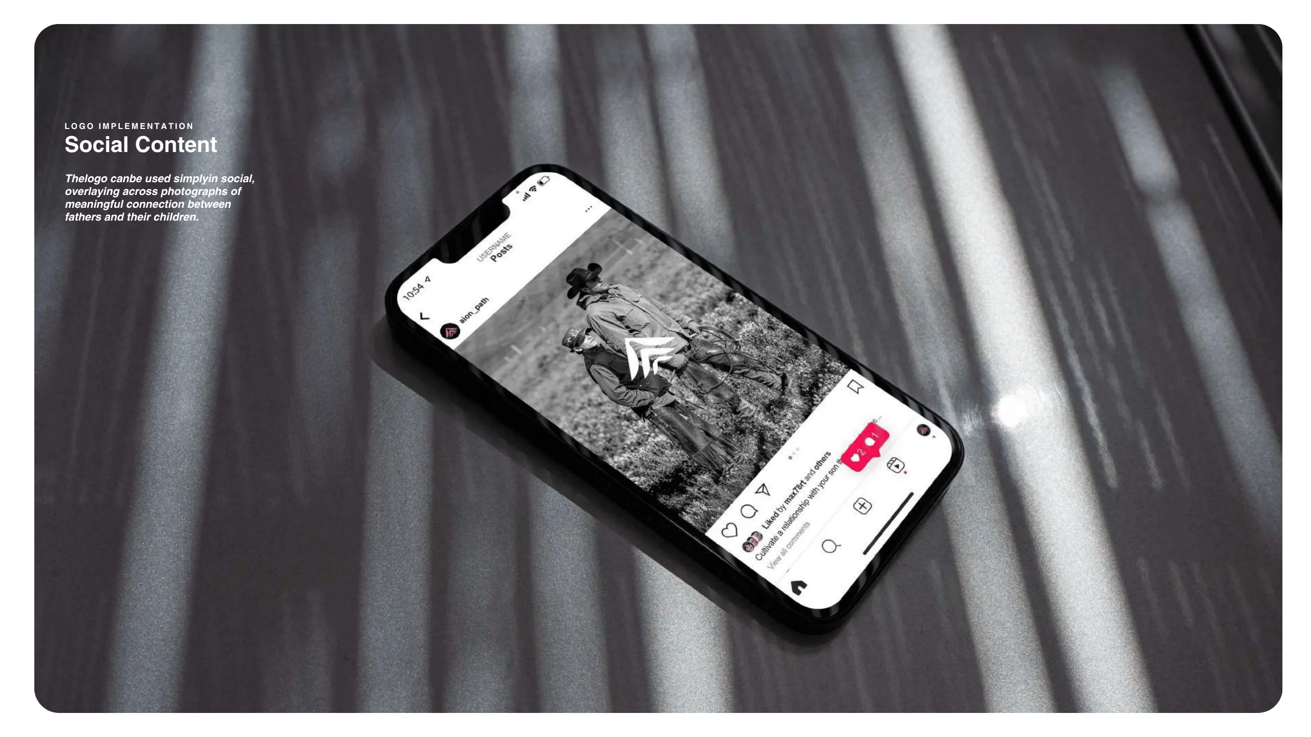 A smartphone displaying a black-and-white Instagram post of a father and child outdoors lies on a gray, reflective surface with streaks of light. Text on the left reads, “Social Content” with a caption about meaningful father-child connections.