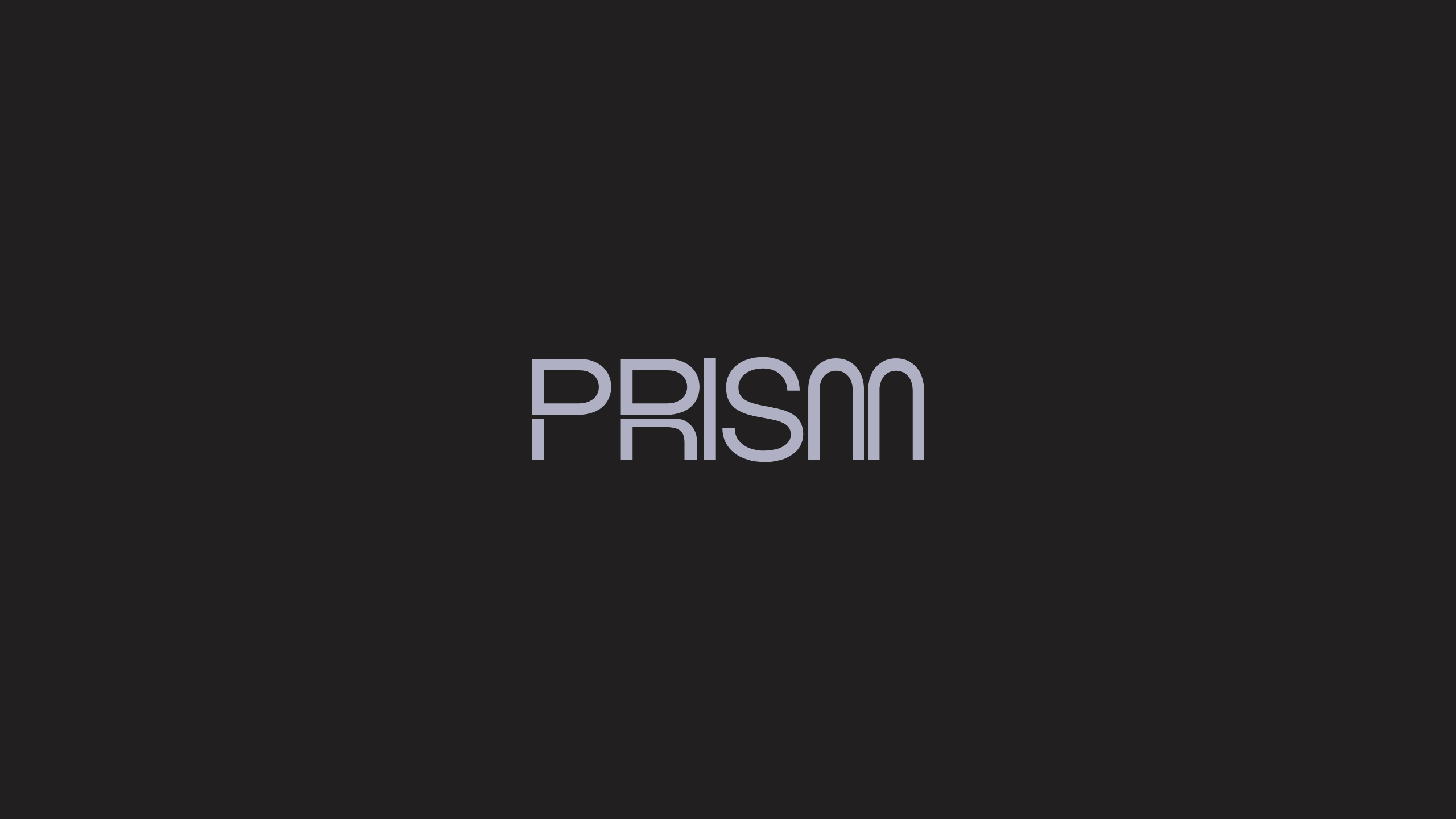 The word PRISM is displayed in modern, light gray uppercase letters on a solid black background. The font is sleek and minimalist, with unique rounded shapes in the letters R and M.