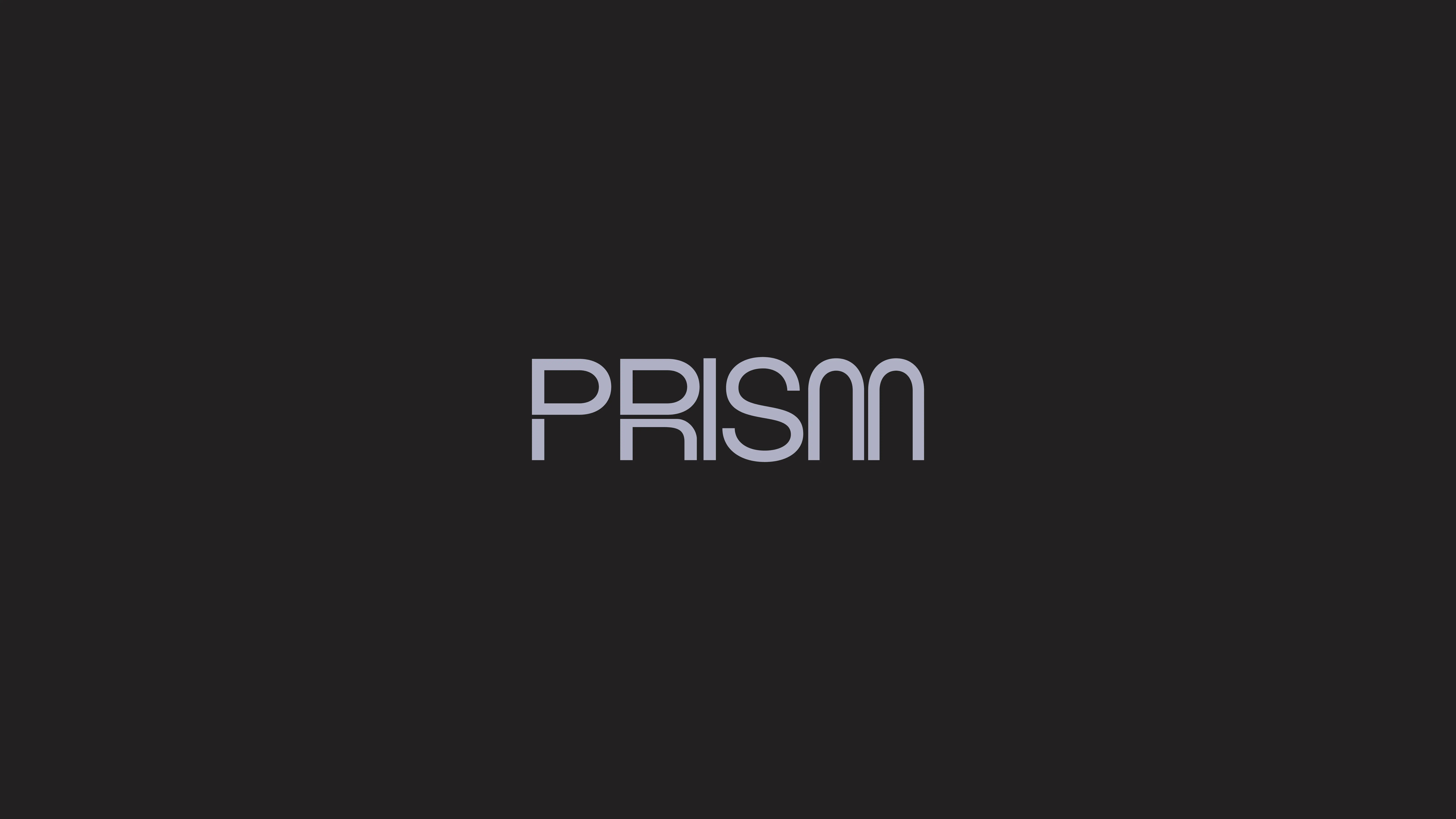 The word “PRISM” is displayed in a modern, light gray font with rounded edges on a solid black background.
