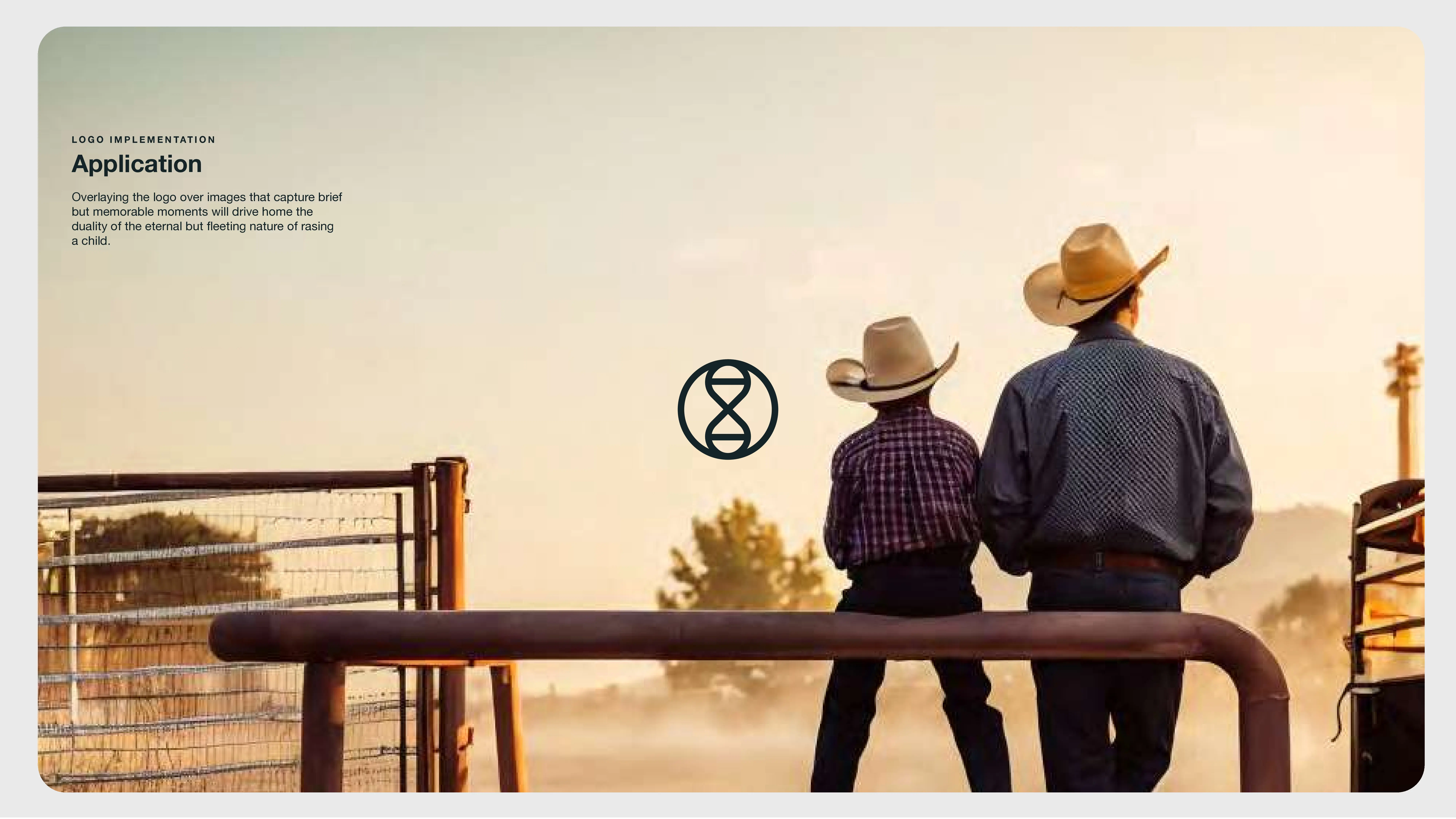 Two people wearing cowboy hats and plaid shirts stand side by side at a metal fence, looking out over a dusty rural landscape at sunset. A simple logo appears in the center of the image.